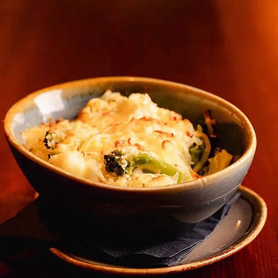 Califlower Cheese served with Sunday Roast in Pub in Cardiff