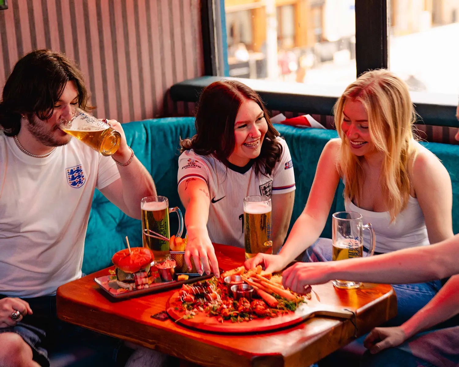 Great sharing food at this live sports bar in Swansea
